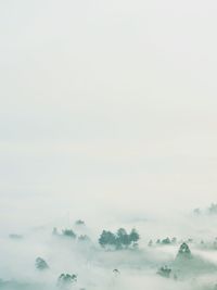 Scenic view of fog against sky