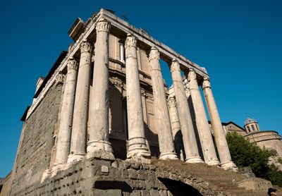 Low angle view of old building against clear sky