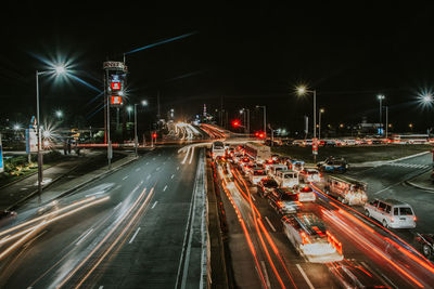 Light trails on city street at night