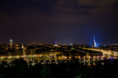 High angle view of illuminated cityscape