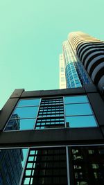 Low angle view of modern building against clear sky