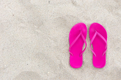 High angle view of shoes on sand