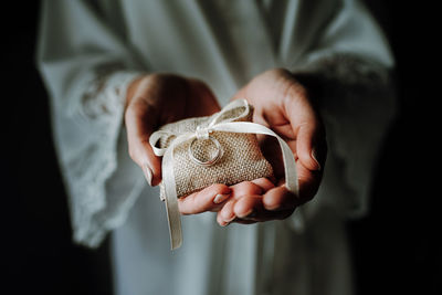 Close-up of man holding hands