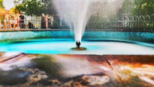 Close-up of water fountain in swimming pool