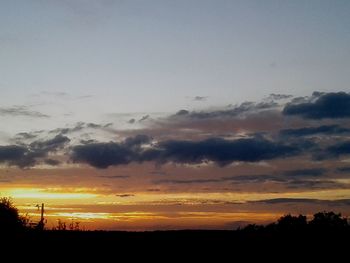 Scenic view of silhouette landscape against sky during sunset