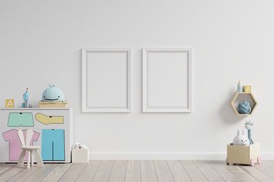 Picture frames hanging on wall at home