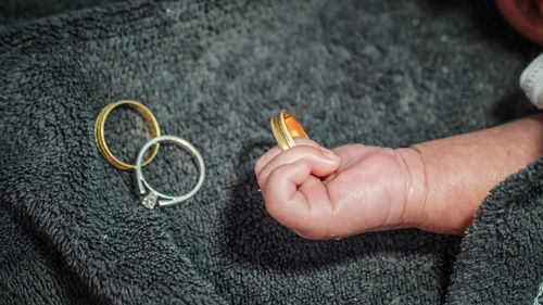 Close-up of hand holding hands