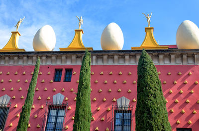 Low angle view of buildings against sky