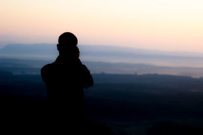 People taking pictures landscape morning sun and mountain