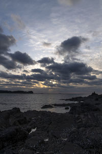 Scenic view of sea against sky during sunset