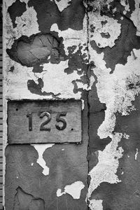 Close-up of text on wall