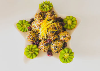 High angle view of fruit salad on white background