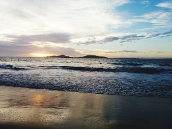 Scenic view of sea at sunset