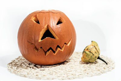 Close-up of pumpkin against white background