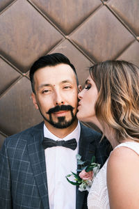 Portrait of newlyweds couple outdoors