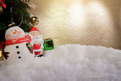 Close-up of christmas tree in snow