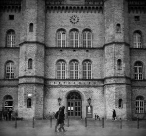 People in front of building