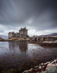 Historic building against cloudy sky