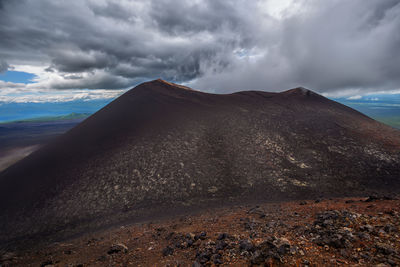 Panoramic view of volcanic landscape against sky