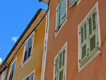 Low angle view of residential building against sky