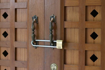 Close-up of locked doors