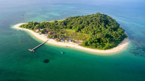 High angle view of bay and palm trees