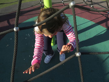 High angle view of girl playing on playground