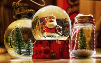 Close-up of ice cream in glass jar on table