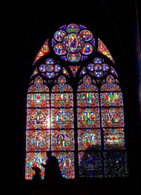 Low angle view of stained glass window in building