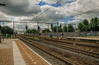 Railroad station platform against sky