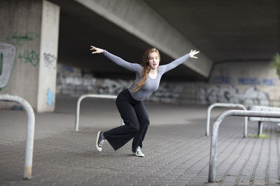 Full length of woman dancing