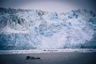 Scenic view of frozen sea against sky