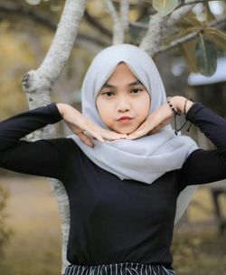 Portrait of girl standing outdoors