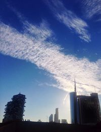 Low angle view of modern buildings against sky