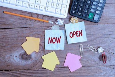 High angle view of information sign on table