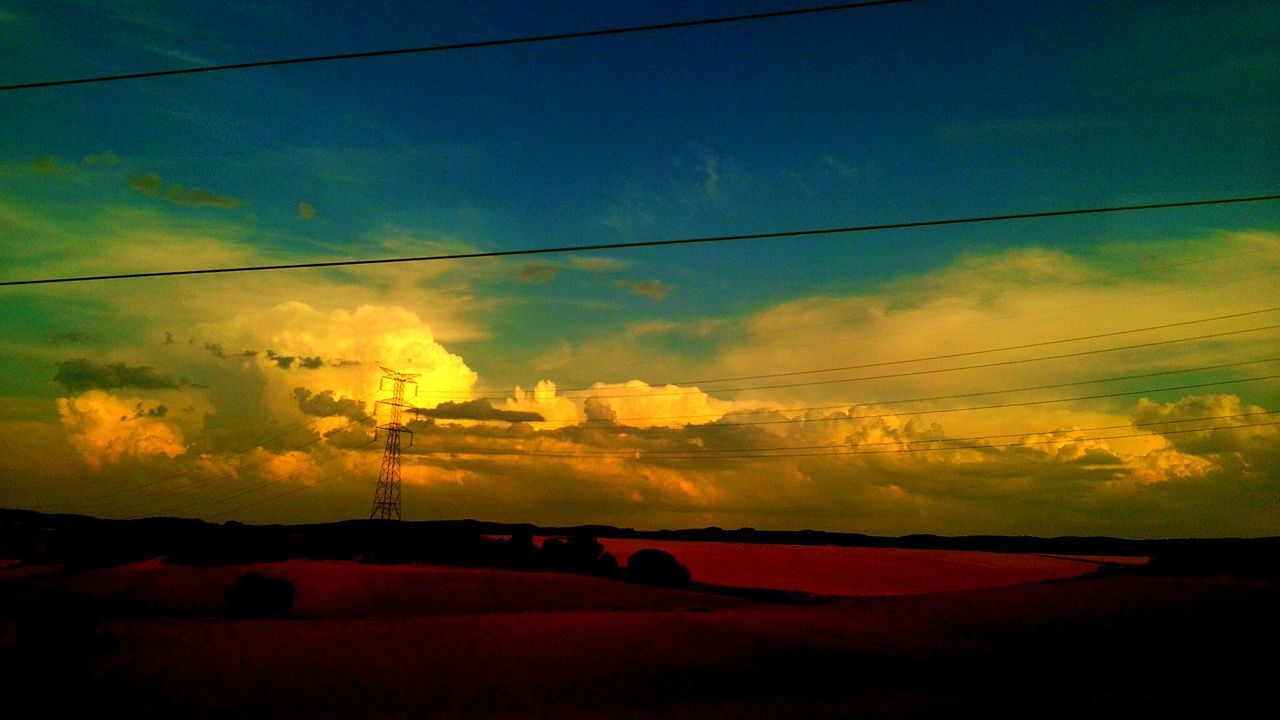 power line, sunset, electricity pylon, sky, power supply, electricity, tranquil scene, landscape, tranquility, scenics, cable, beauty in nature, silhouette, nature, cloud - sky, fuel and power generation, orange color, cloud, connection, power cable