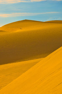 Scenic view of desert against sky