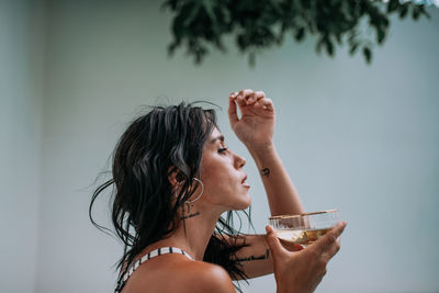 Portrait of a woman drinking glass