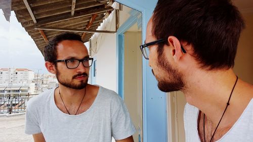 Portrait of young man looking away