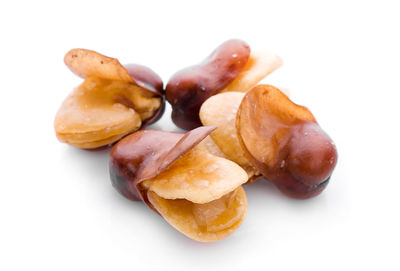 Close-up of fruits against white background