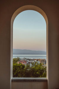 Scenic view of sea seen through window