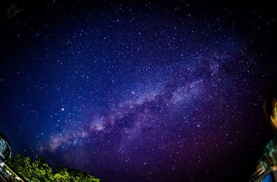 Low angle view of stars in sky at night