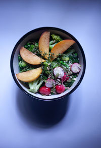 Close-up of fruits in bowl on table
