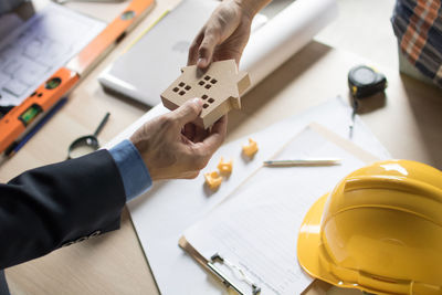 High angle view of man working on table