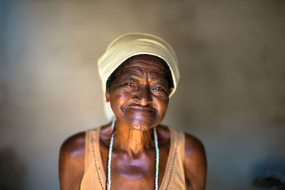 Portrait of smiling woman standing outdoors