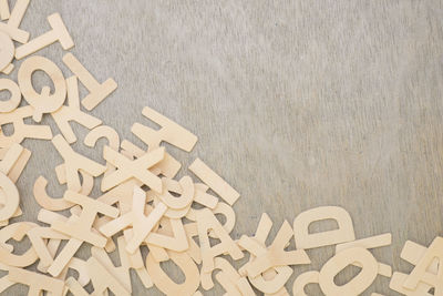 Directly above shot of letters on wooden table