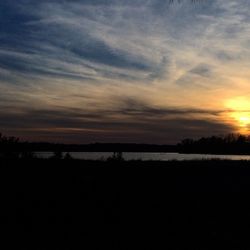 Scenic view of landscape at sunset