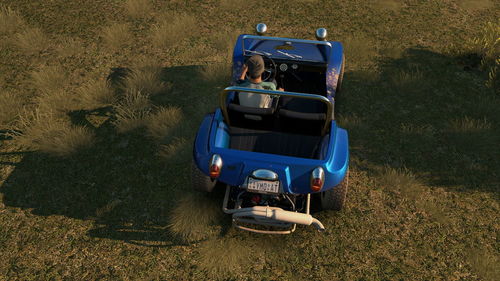 High angle view of people on road amidst land