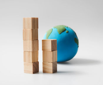 Close-up of blue toy against white background