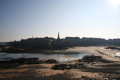 View of cityscape against clear sky